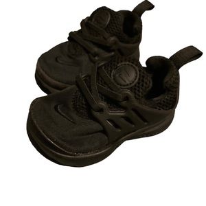 All black Huarache sneakers